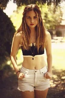 Liana Liberato looks hot in a skimpy belly top and hotpants 