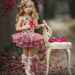 Such a doll! Cute picture of little girl in tutu and lace up