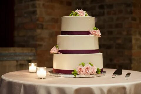 Three Tier Wedding Cake Decorated with Burgundy Ribbon