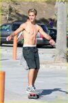 Austin North Skateboards Shirtless Before Slipping On A Piec