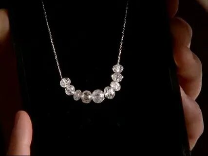 close up of Carrie Bradshaw's diamond necklace (in Paris = s