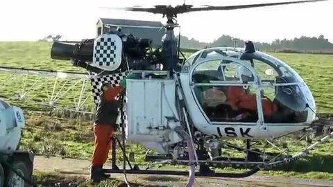 Lama SA315B Helicopter Loading Chemical. - YouTube