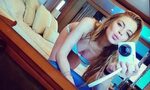 Lindsay Lohan puts her cleavage on display in sexy selfie...