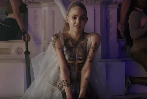 Grimes returns with new 'Violence' video