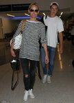Amber Valletta with teen son Auden while touching down at LA