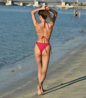 Chloe Veitch - In a red bikini on the beach in Dubai GotCele