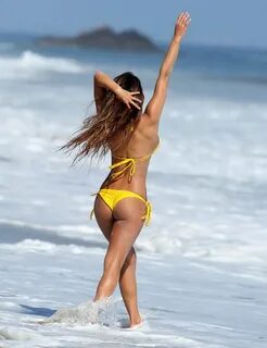Eryn Krouse wearing tiny yellow bikini at the beach for 138 