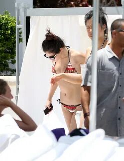 Selena Gomez in bikini by a hotel pool in Miami 5/11/13 Unra