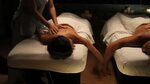 tracking shot couple getting massage spa Stock Footage Video