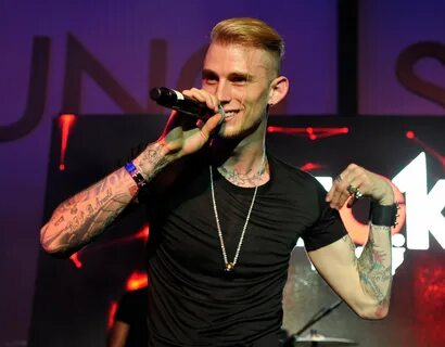 Machine Gun Kelly Fires Back at Eminem in New Diss Track, 'R