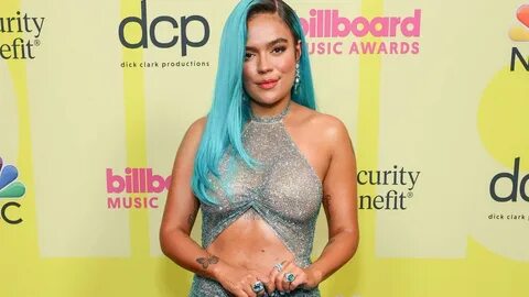 Karol G Rocks Stunning Sheer Gown and Bright Blue Hair at 20