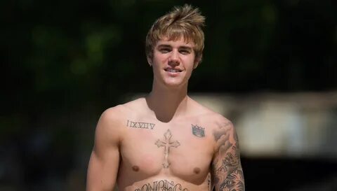 Justin Bieber’s Body Is Ripped in New Shirtless Beach Photos