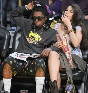 Lil Wayne's girlfriend shows off sparkler at Los Angeles Lak