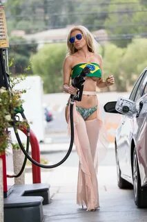 Ana Braga: Wears Brazil top at gas station -05 GotCeleb