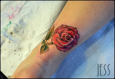 Black Ink Blade And Red Rose Tattoo On Arm Sleeve