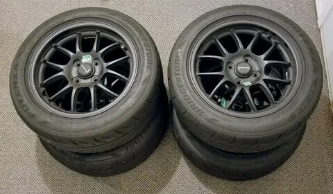 FS: Set of black 15x7.5 6UL with RE71R 205/50R15 - SOLD