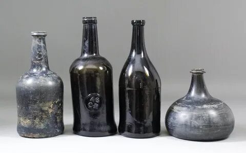 An early sealed wine bottle - auctions & price archive