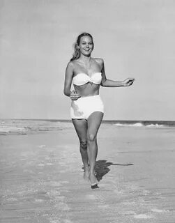 Woman Running On Beach Photograph by George Marks Fine Art A