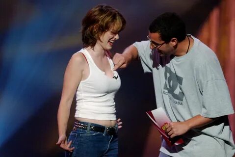 Adam Sandler Checking out if Winona Ryder's boobs are real A