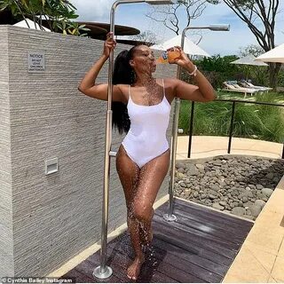 Cynthia Bailey of RHOA flaunts her fab figure in white wet s