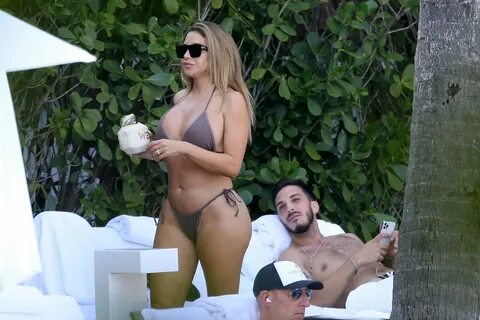 Larsa Pippen - In a bikini with a mystery man by the pool in Miami-24 GotCeleb