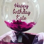 Send a special birthday message on a beautiful plum feather 