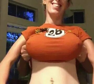 Sexy Redhead Flashing Her Tits