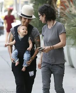 Sara Gilbert and wife Linda Perry gaze at baby boy Rhodes du