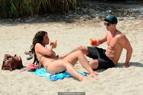 Vicky Patterson in leopard bikini on the beach Celebs Dump