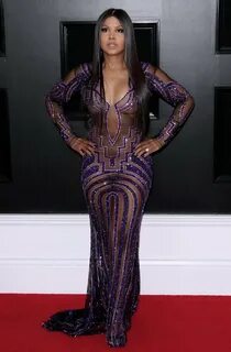 Toni Braxton braless in a purple see-through dress at the 61