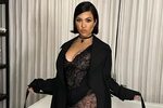 Kourtney goes nearly naked under sheer catsuit after showing