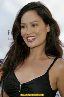 Tia Carrere slight cleavage and legs paparazzi shots