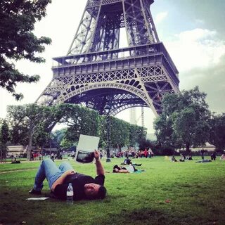 Wallpaper People relax on the grass near the Eiffel Tower " 