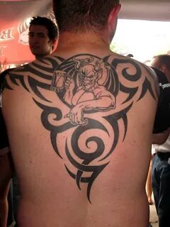 Gargoyle n tribal tattoo design on back body - Tattoos Book 