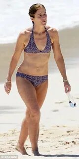 Caroline Kennedy looks bikini fabulous at 54 during beach ho