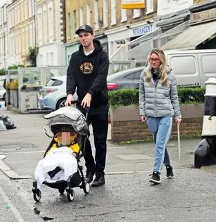 Nicholas Hoult seen for first time with baby son as he and B
