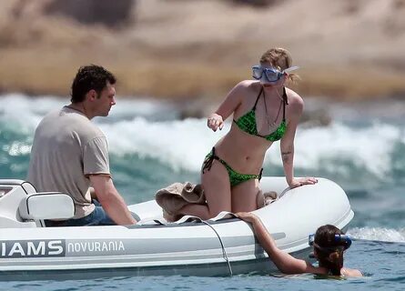 Avril Lavigne in a green bikini in Cabo, Mexico on July 27, 