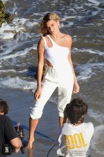 Hailey Bieber braless nipples pokies in a white top at the b