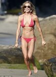 LeAnn Rimes cuts a much more healthier figure in a white and