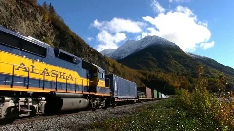 Beautiful scenery with Alaska railroad GP40-2's and freight 