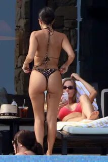 kourtney kardashian wears a leopard print bikini while she r