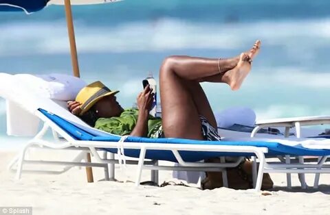 Kelly Rowland flaunts her legs on Miami Beach as she laughs 