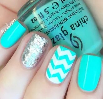 This bright and beautiful turquoise blue manicure is by @mel