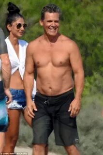 Josh Brolin, 50, flaunts his muscular frame during a paddle 