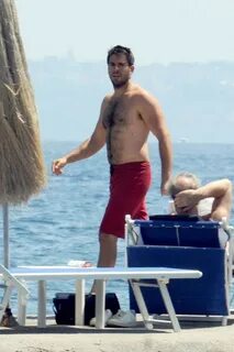 Eli Roth barechested in Red Swim Trunks. Ischia Global Film 