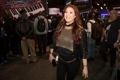 Tiffany, '80s teen pop idol, walks the NAMM floor meeting fa