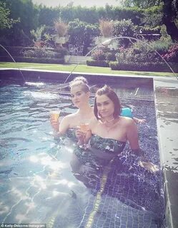 Kelly Osbourne has photo fail with baby arm in pool snap