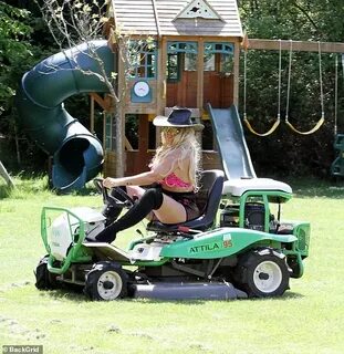 Katie Price rides lawnmower in hot pink leopard print bikini