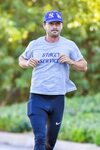 Shia LaBeouf bulges out of blue spandex on a run after Fast 
