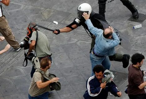 Athens Riot Police Beats Photo-Reporters (pcts, video)